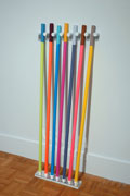 an array of brightly colored walking sticks