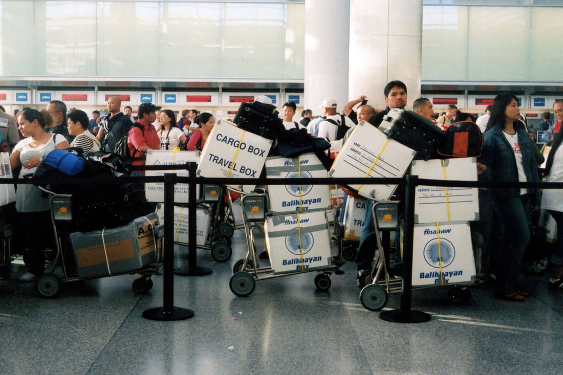 Balikbayan (“repatriate box”) boxes at San Francisco International Airport, headed towards Manila.