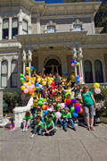 The Great Balloon Giveaway team included children from the City of Oakland's
  Lincoln Square Recreation Center, Christian L. Frock, and volunteers from Mills College and the Camron-Stanford House.