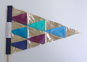 Irrational Exuberance (Asst. Colors) Mini Flags, 2012, fabric, thread, wood, woven labels, ~15 x 18 inches / 38 x 45 cm each