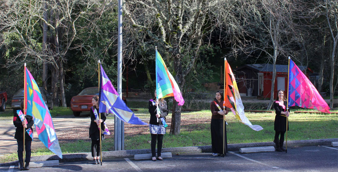 Flag bearers standing in position next the 30' flagpole: Rick Maciel, Leah Rosenberg, Donna Conwell, Elizabeth Travelslight, and Lauren Baines.