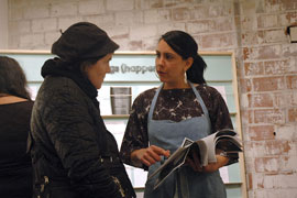  Lauren Marie Taylor (right) discusses her star chart activity with Lexa Walsh (left).