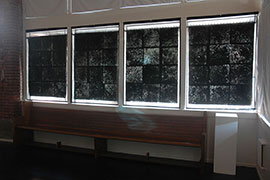 Window #1–4</em> (interior view), handmade paper: cotton rag, silver Mylar, cellophane, ~57 x 43.5 inches each, unique. Installation view at Portland ‘Pataphysical Society, Portland, OR.