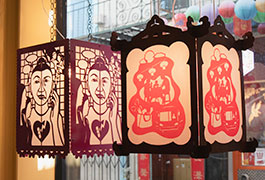 2 lanterns in Chinese Culture Center's storefront