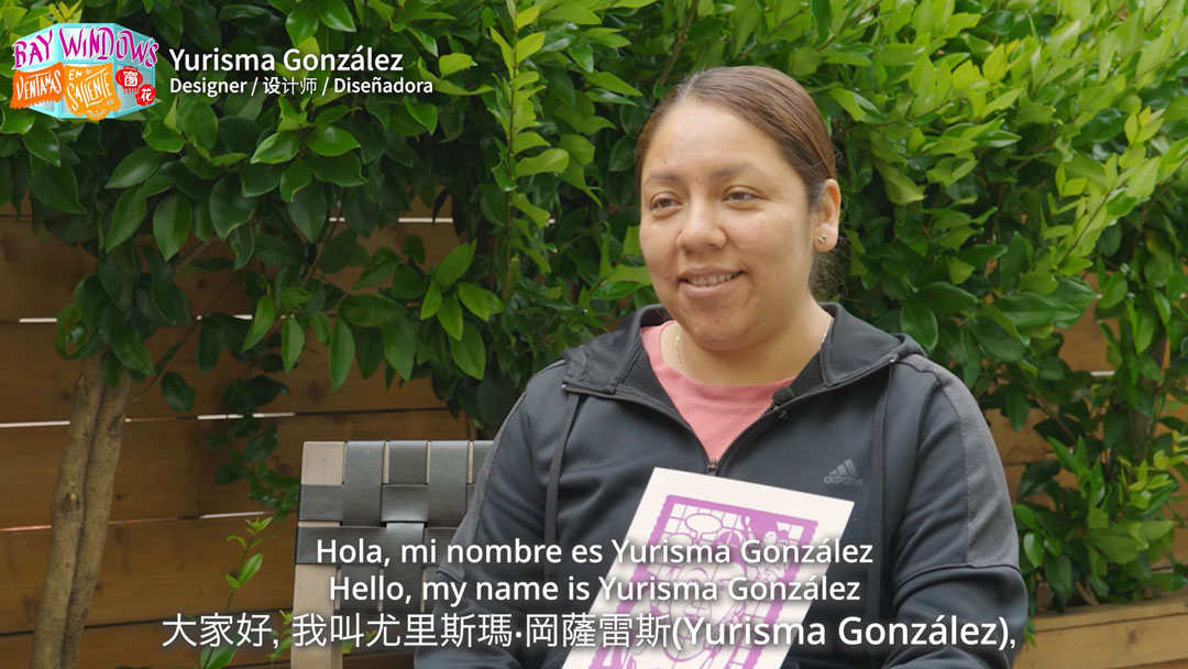 still of trilingually subtitled video interview with a woman, available at the link